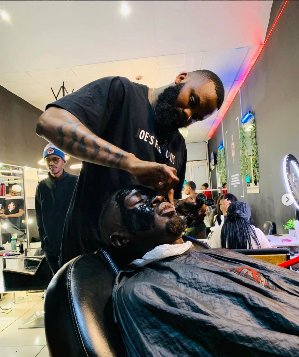 Barber applying the finishing touches