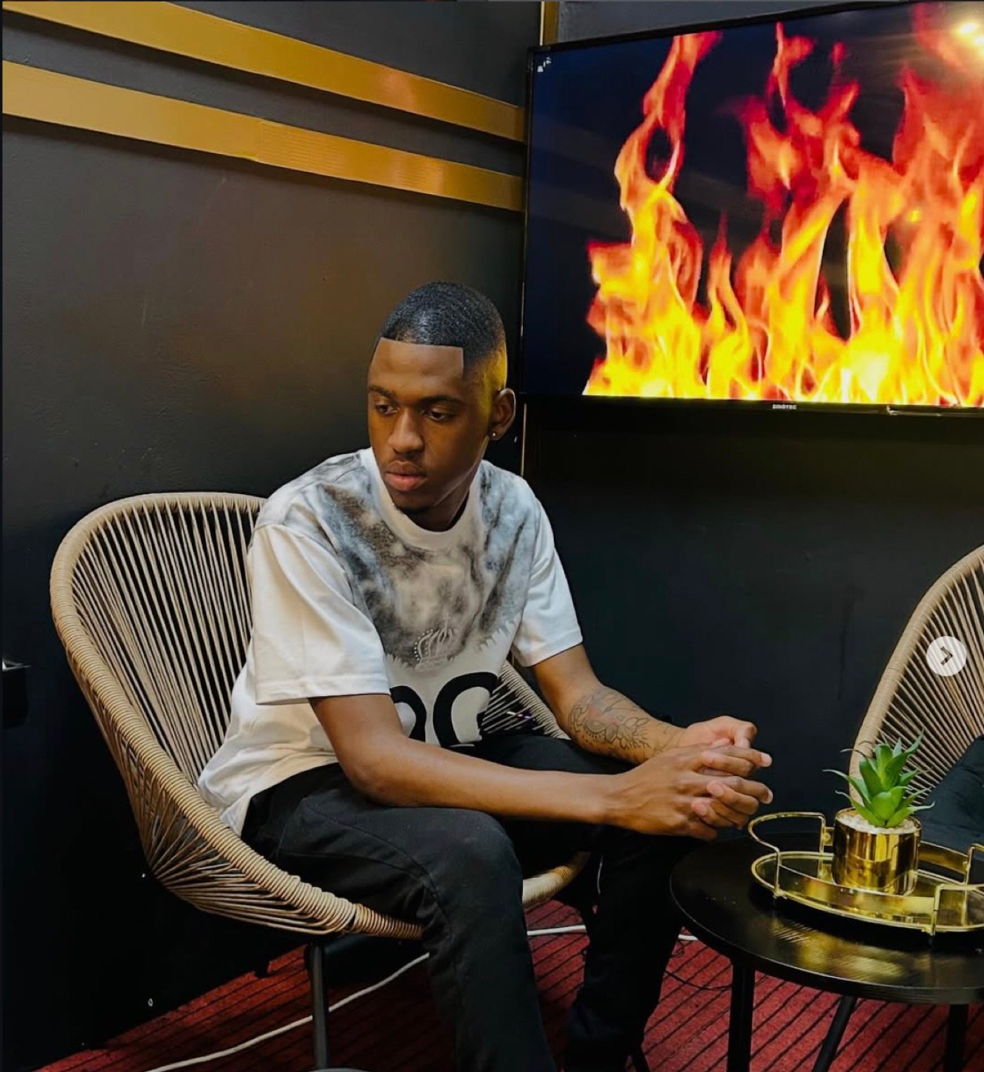 Client relaxing in the VIP lounge at Joe's Fade Cuts
